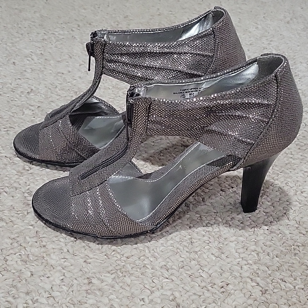 apostrophe silver sparkley shoes.  Zipper front.  Size is 7.5.